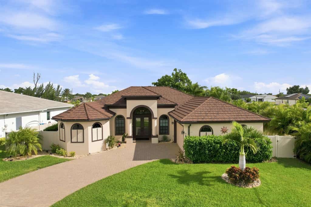 Welcome to your perfect Cape Coral waterfront escape! This beautiful four-bedroom home offers everything you need for a relaxing Southwest Florida vacation. Nestled along a peaceful waterfront setting, the property combines comfort, privacy, and outdoor living, making it an ideal retreat for families, couples, and friends.

Spend your days soaking up the Florida sunshine by the private pool, enjoying the tranquil water views, or unwinding on the lanai with your morning coffee or evening cocktail. This pet-friendly home allows your four-legged family members to join in on the vacation, so everyone can enjoy a memorable getaway together.

Inside, you'll find spacious and inviting living areas designed for comfort, along with a fully equipped kitchen that's perfect for preparing everything from quick breakfasts to family dinners. The open layout provides plenty of room to relax after a day of exploring Cape Coral and the surrounding area.

Conveniently located near local restaurants, shopping, golf courses, parks, and the area's beautiful beaches, this home offers the perfect balance of peaceful waterfront living and easy access to Southwest Florida's top attractions. Whether you're fishing from the backyard, lounging by the pool, or discovering all that Cape Coral has to offer, this waterfront retreat is the perfect place to create lasting vacation memories.