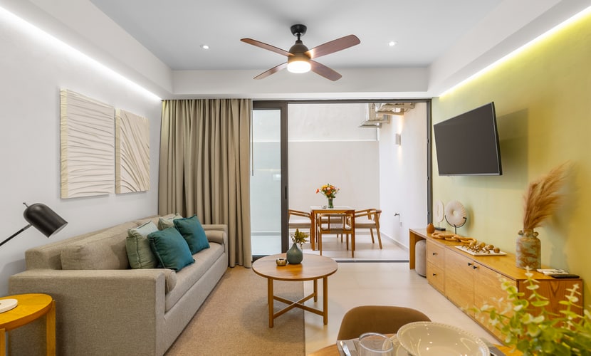 2BR condo in La Cruz with pool, balcony, AC, WiFi & kitchen.