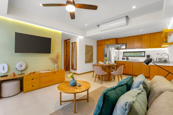 2BR condo in La Cruz with pool, balcony, AC, WiFi & kitchen.