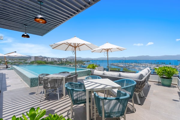 2BR condo in La Cruz with pool, balcony, AC, WiFi & kitchen.