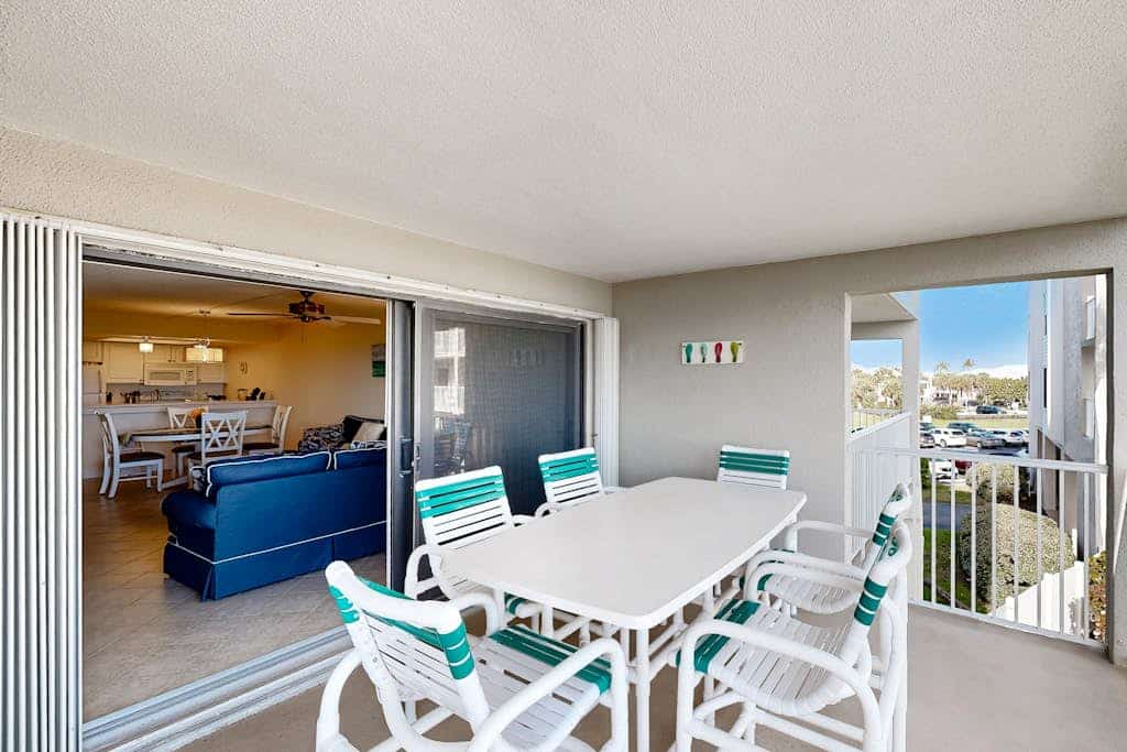 Beachfront condo with ocean views, pool, sundeck, & private balcony