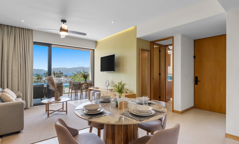 New Home 3BR condo near the ocean with pool, gym, AC, and full kitchen