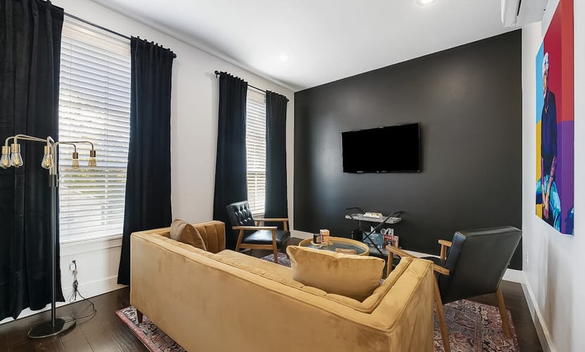 Stylish condo with WiFi, board games, washer/dyer, & central AC