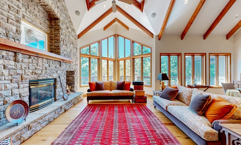Elegant lake house with gourmet kitchen, game room, scenic views & lake frontage
