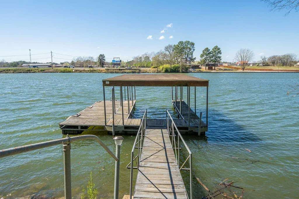 Sunroom Charm & Lakefront Dock Living with Stunning Lake Hamilton Sunsets