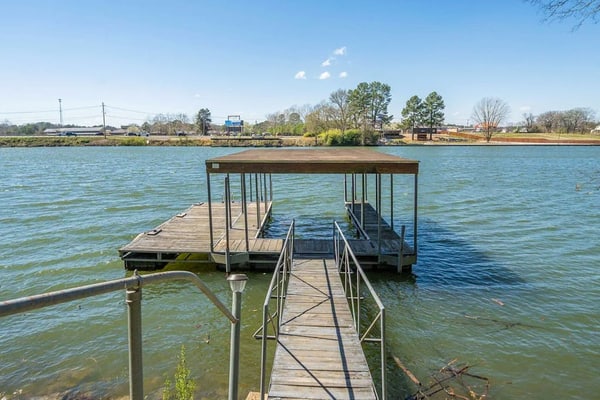 Sunroom Charm & Lakefront Dock Living with Stunning Lake Hamilton Sunsets