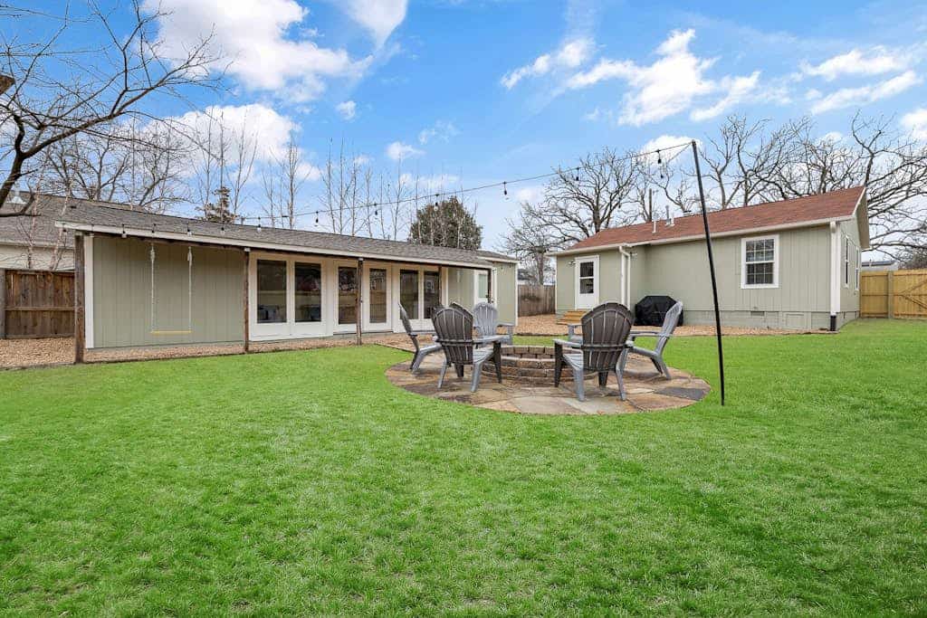 Dog-friendly home with a firepit, yard, washer/dryer, central AC & game room