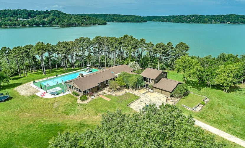 Dog-friendly home with lake views, washer/dryer, pool, basketball & fireplace