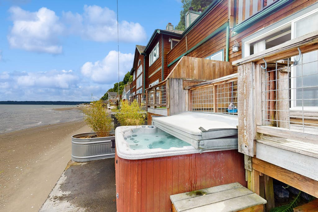 Stunning Waterfront Estate with Private Beach Access and Hot Tub