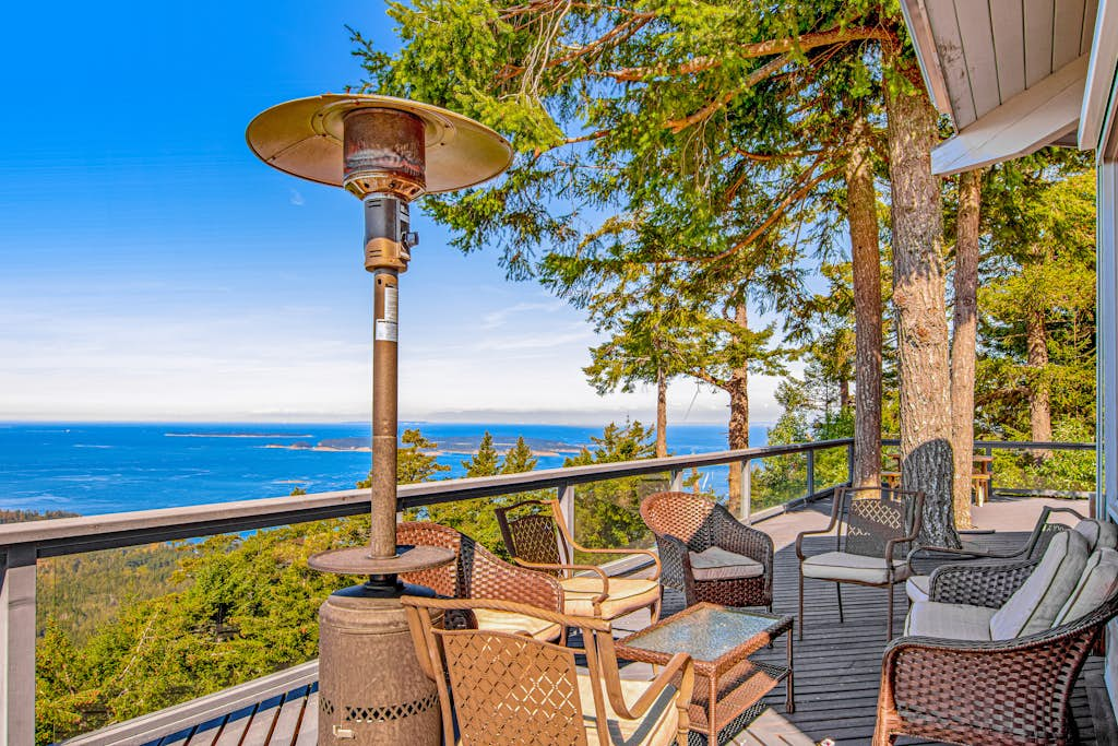 Stunning Mountaintop Retreat with Private Sauna and Water Views