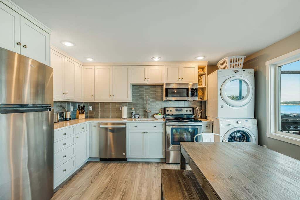 Waterfront Family Friendly Home with Bay Views, Firepit, Deck, & Fireplace