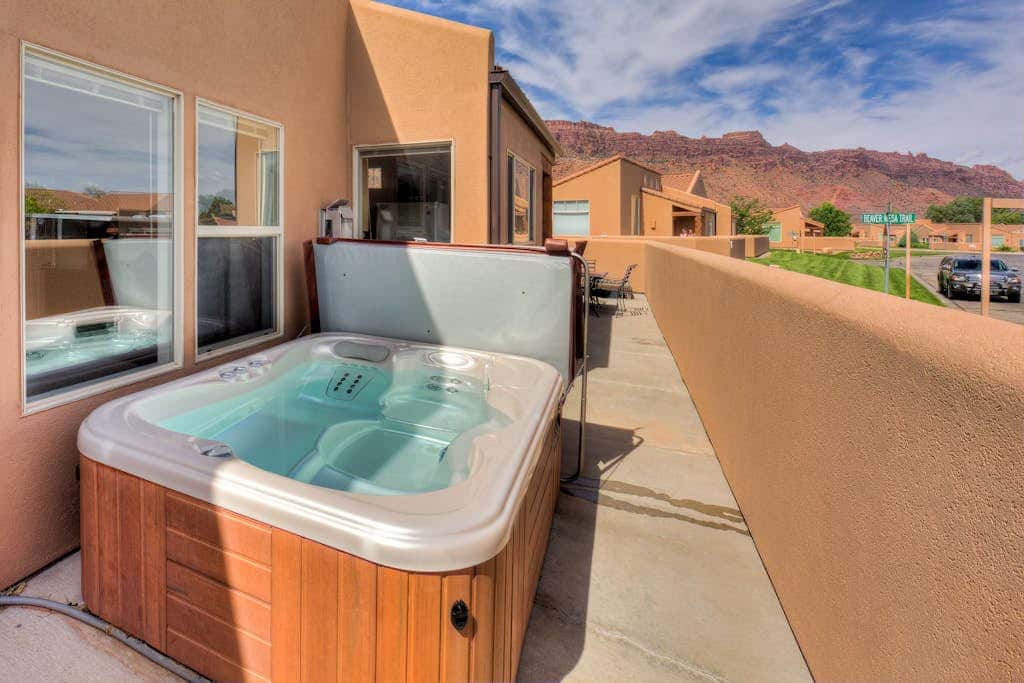 Mountain Rim Village View Home with Private Hot Tub and Shared Pool - Dog Friendly