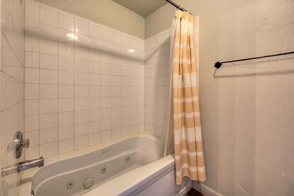 Mountain Rim Village View Home with Private Hot Tub and Shared Pool - Dog Friendly