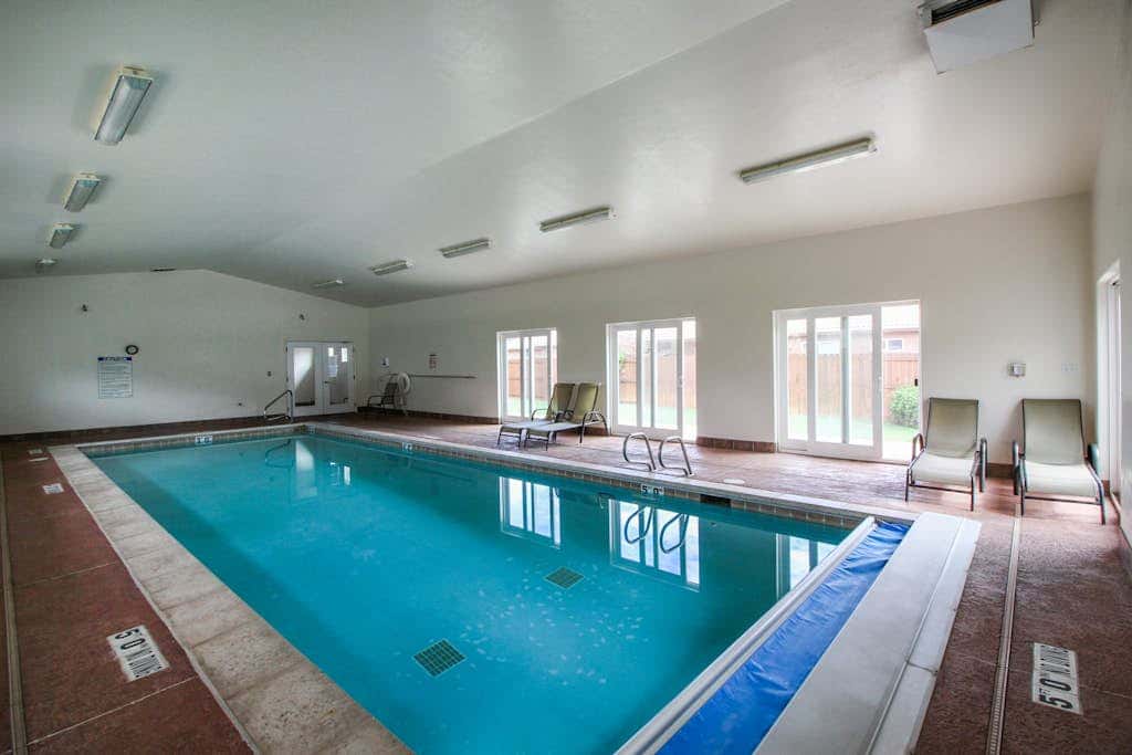 Beautiful Dog-Friendly Home with Shared Indoor Pool, Yard, WiFi, and Fireplace