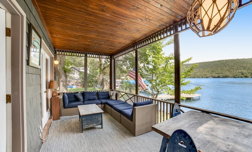 Unique & charming lakefront home with screened-in patio