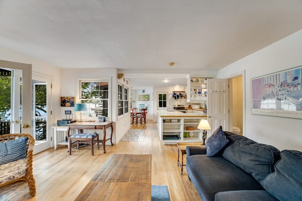 Unique & charming lakefront home with screened-in patio