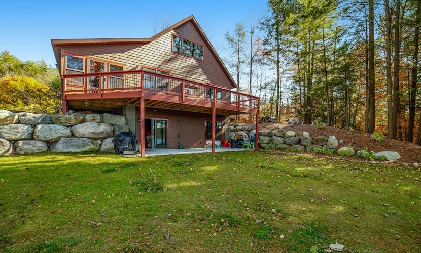 Gorgeous Lakefront Home with a Fire Pit, Two Living Areas, and a Sunroom