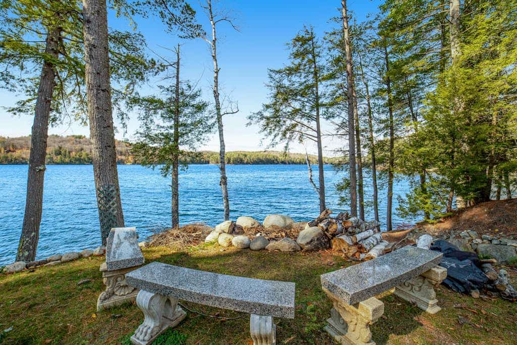 Gorgeous Lakefront Home with a Fire Pit, Two Living Areas, and a Sunroom