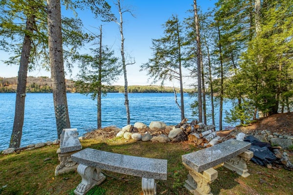 Gorgeous Lakefront Home with a Fire Pit, Two Living Areas, and a Sunroom