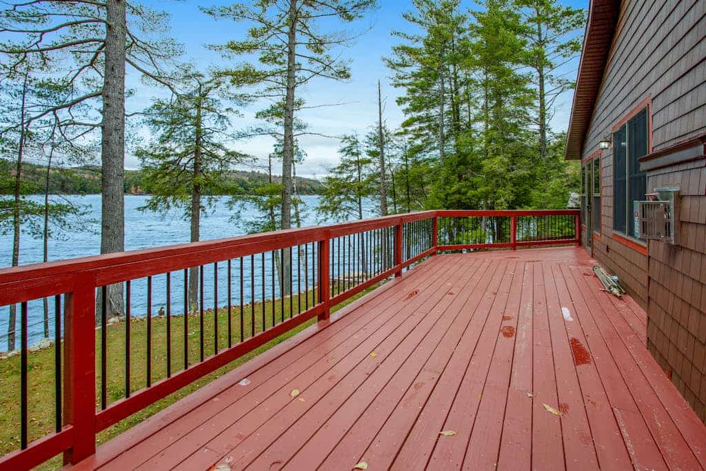 Gorgeous Lakefront Home with a Fire Pit, Two Living Areas, and a Sunroom