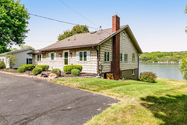 Lakefront gem with game room and dock - the house that almost floated away