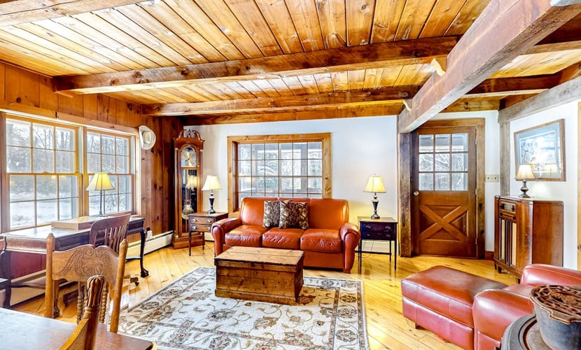 1970s acreage surrounded by trees with deck, grill, & internet