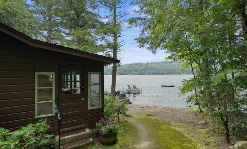Lakefront house with dock, sandy beach, full kitchen, gorgeous views