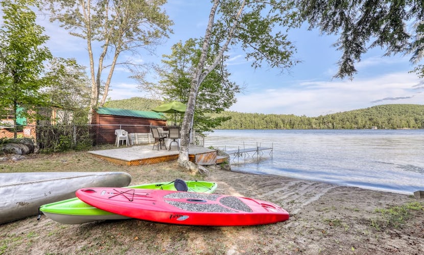 Peaceful lakefront house with private dock and sandy beach