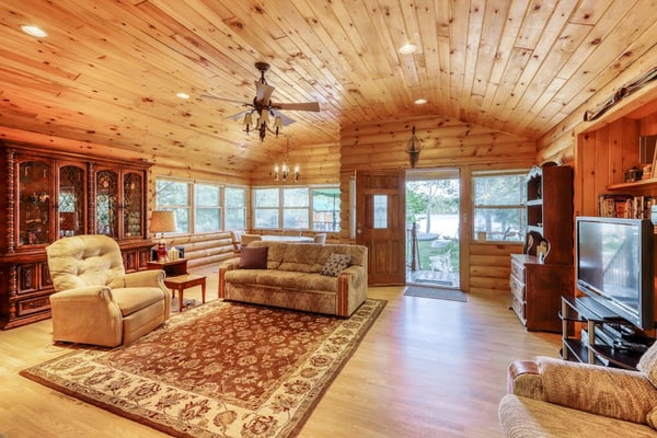Peaceful lakefront house with private dock and sandy beach