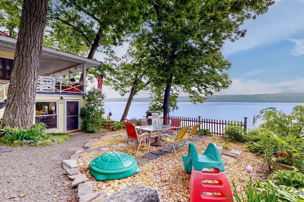 Lakefront home with private hot tub, dock, boat lift & firepit - 2 dogs welcome