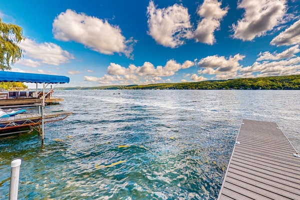 Delightful lakefront house with furnished deck, balcony, and private dock