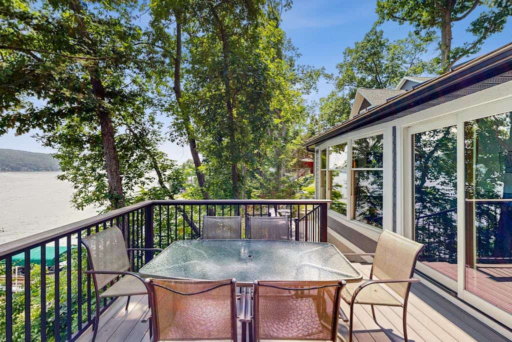 Delightful lakefront house with furnished deck, balcony, and private dock