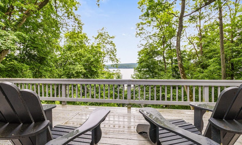 Gorgeous lakeview retreat with wraparound porch, wood stove, & WiFi - dogs OK