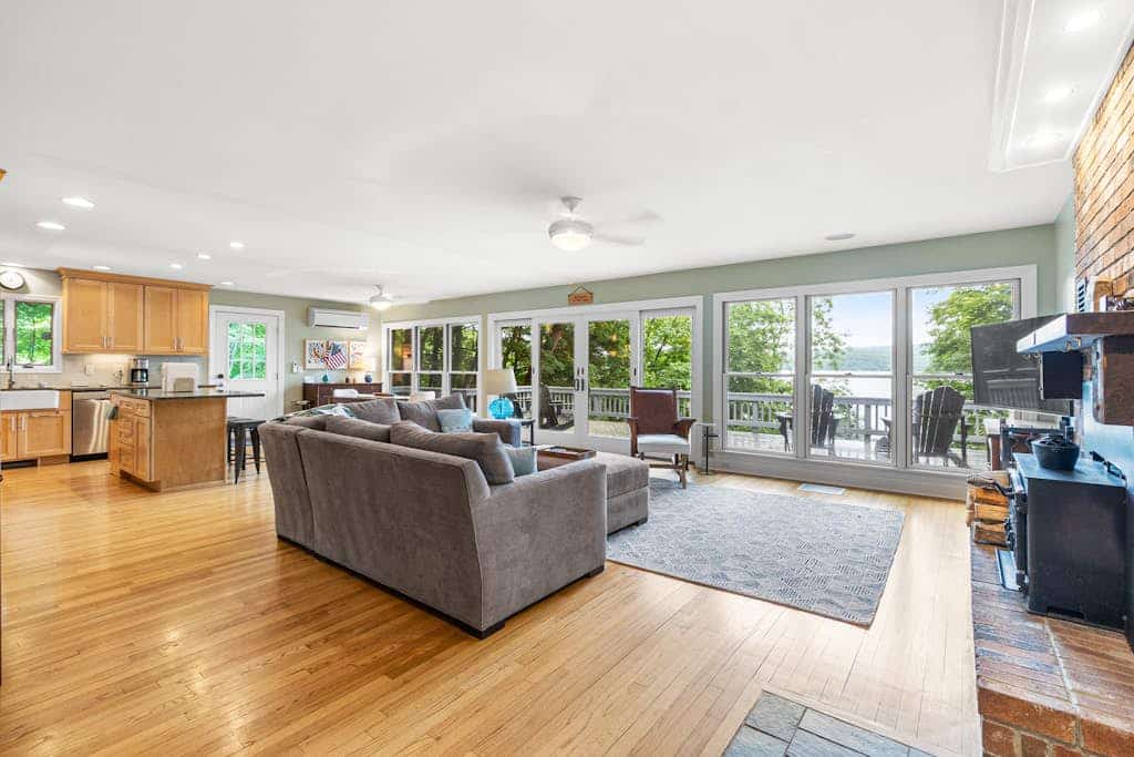 Gorgeous lakeview retreat with wraparound porch, wood stove, & WiFi - dogs OK
