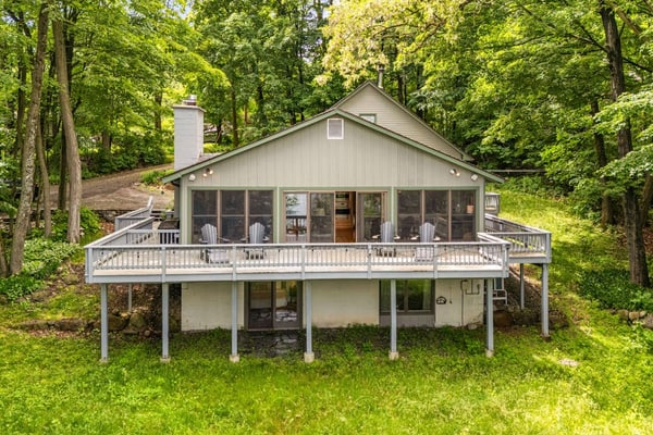 Gorgeous lakeview retreat with wraparound porch, wood stove, & WiFi - dogs OK