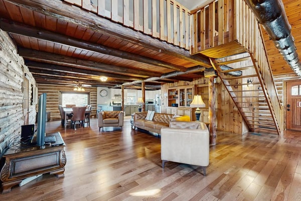 Relaxing dog-friendly water-view cabin with firepit, deck, grill, & full kitchen