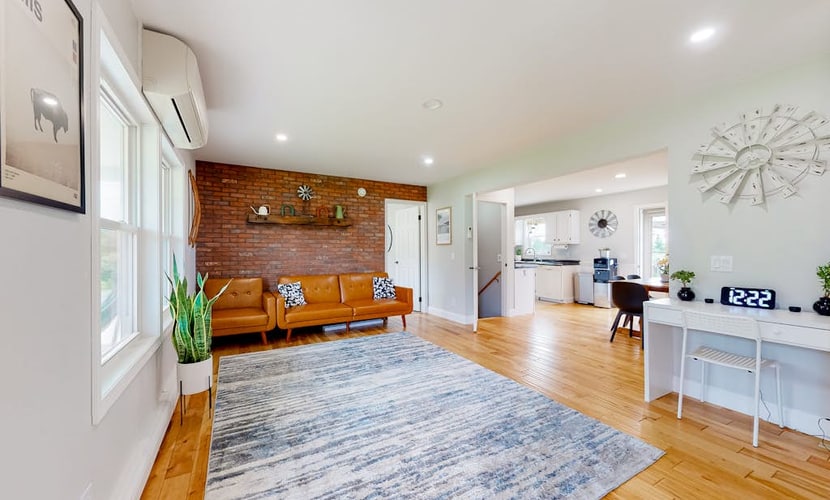 Relaxing two-story home with a deck, firepit, game room, & washer/dryer