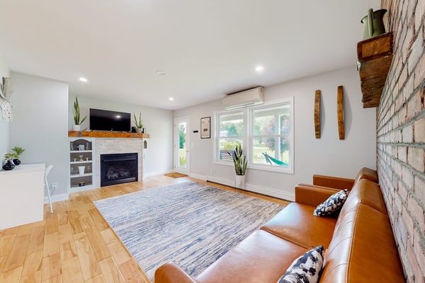 Relaxing two-story home with a deck, firepit, game room, & washer/dryer