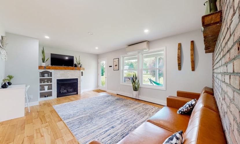 Relaxing two-story home with a deck, firepit, game room, & washer/dryer