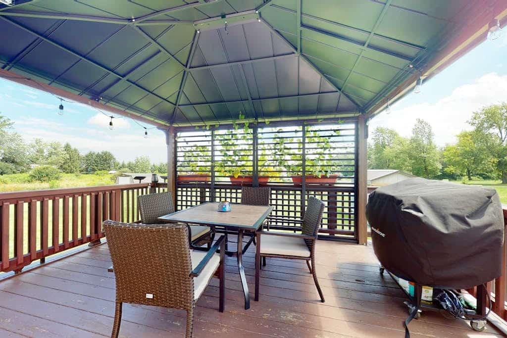 Relaxing two-story home with a deck, firepit, game room, & washer/dryer