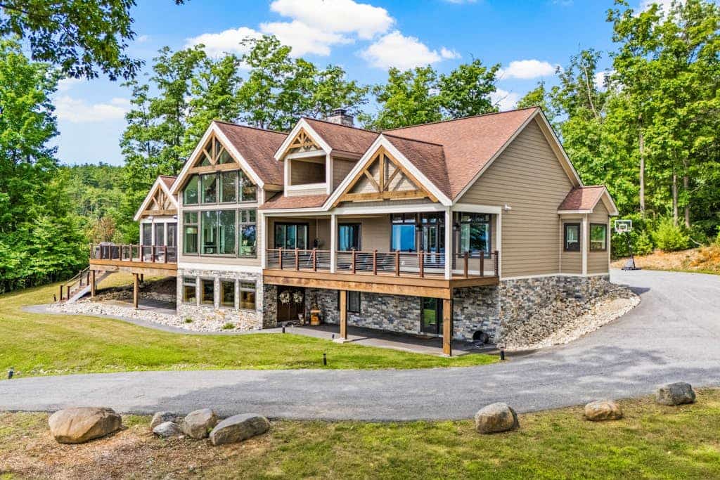 Panoramic lake view acreage with game room, sauna & fireplace