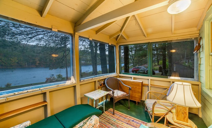 Classic riverfront cottage w/ beautiful water views, WiFi, & screened porches