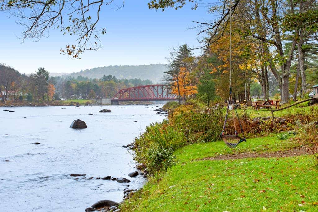 Classic riverfront cottage w/ beautiful water views, WiFi, & screened porches