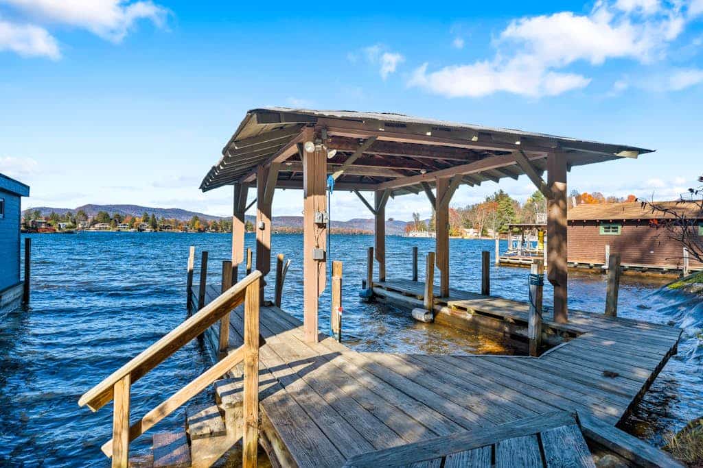 Scenic lakefront retreat with water access, private dock, grill, W/D & fireplace