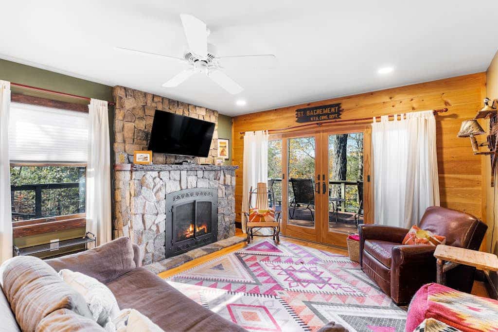 Scenic lakefront retreat with water access, private dock, grill, W/D & fireplace