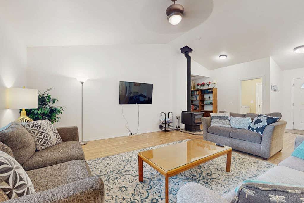 Dog-friendly lakefront home near skiing with mountain view, firepit & wood stove