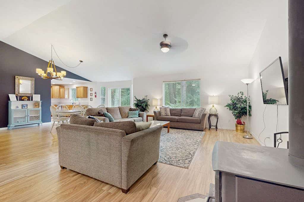 Dog-friendly lakefront home near skiing with mountain view, firepit & wood stove