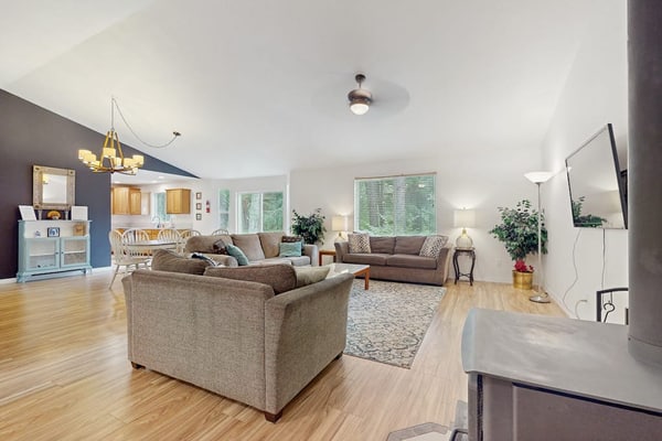 Dog-friendly lakefront home near skiing with mountain view, firepit & wood stove
