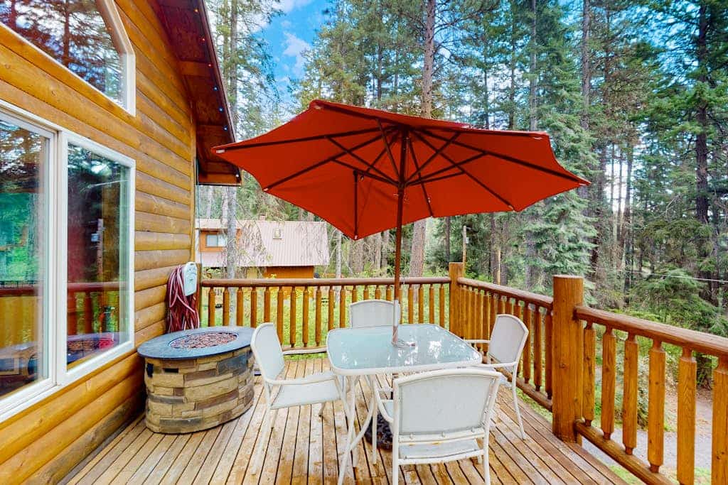 Three-story, dog-friendly home with a private hot tub, firepit, & wood stove