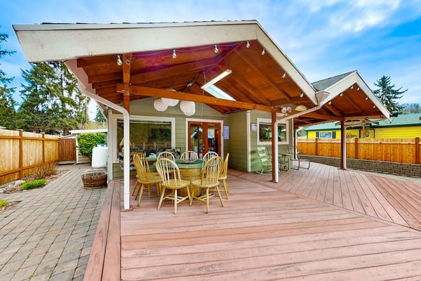 Dog-friendly riverfront home with patio, golf nearby, enclosed yard, & W/D